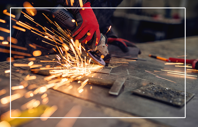 manpower-using-electric-angle-grinder-for-metal-fabrication