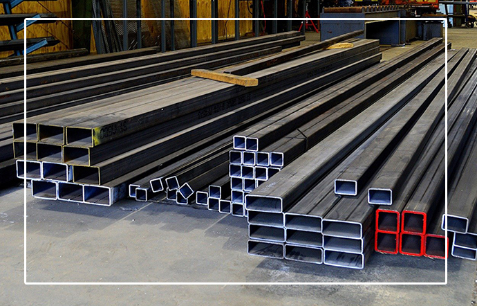 different-sized-structural-steels-stored-in-a-room